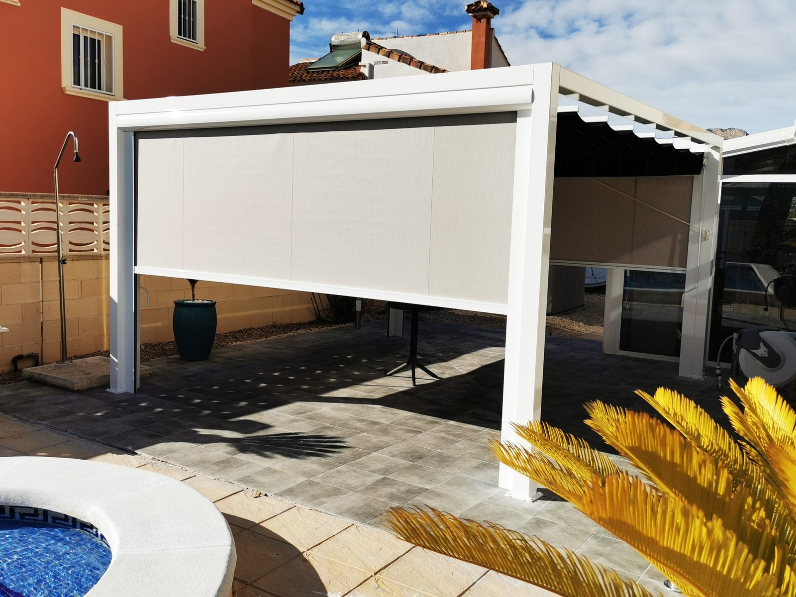 Carport pergola with sliding awning in Alicante